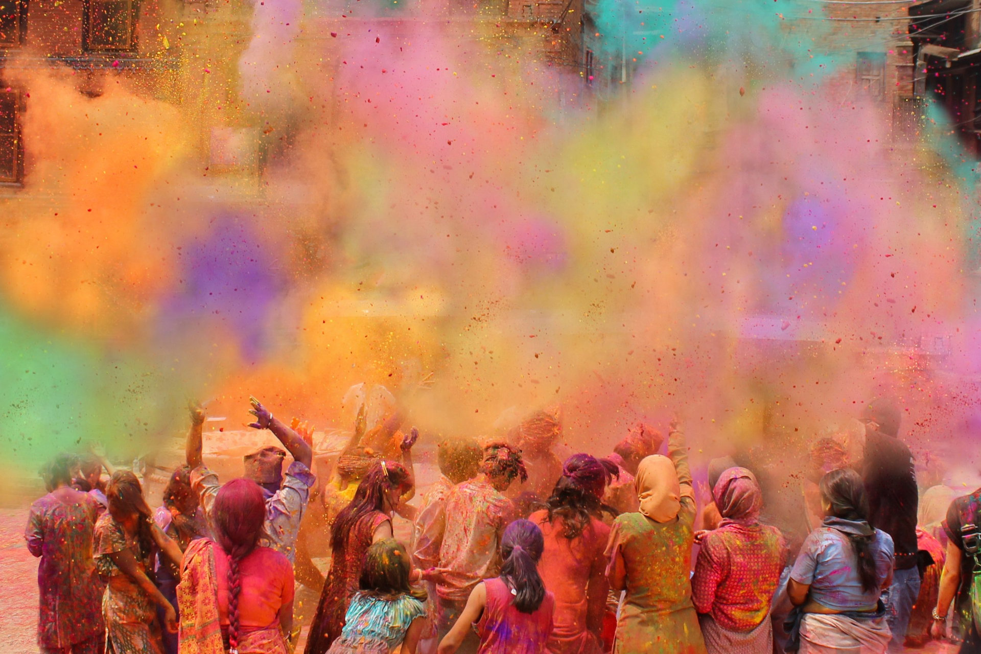 People celebrating Holi festival of colors, India