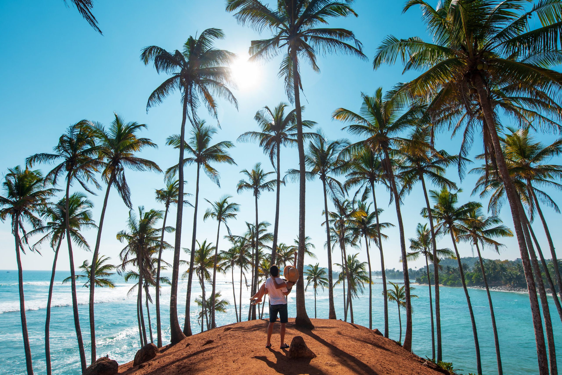 Loving couple at Coconut tree hill in Mirissa, Sri Lanka