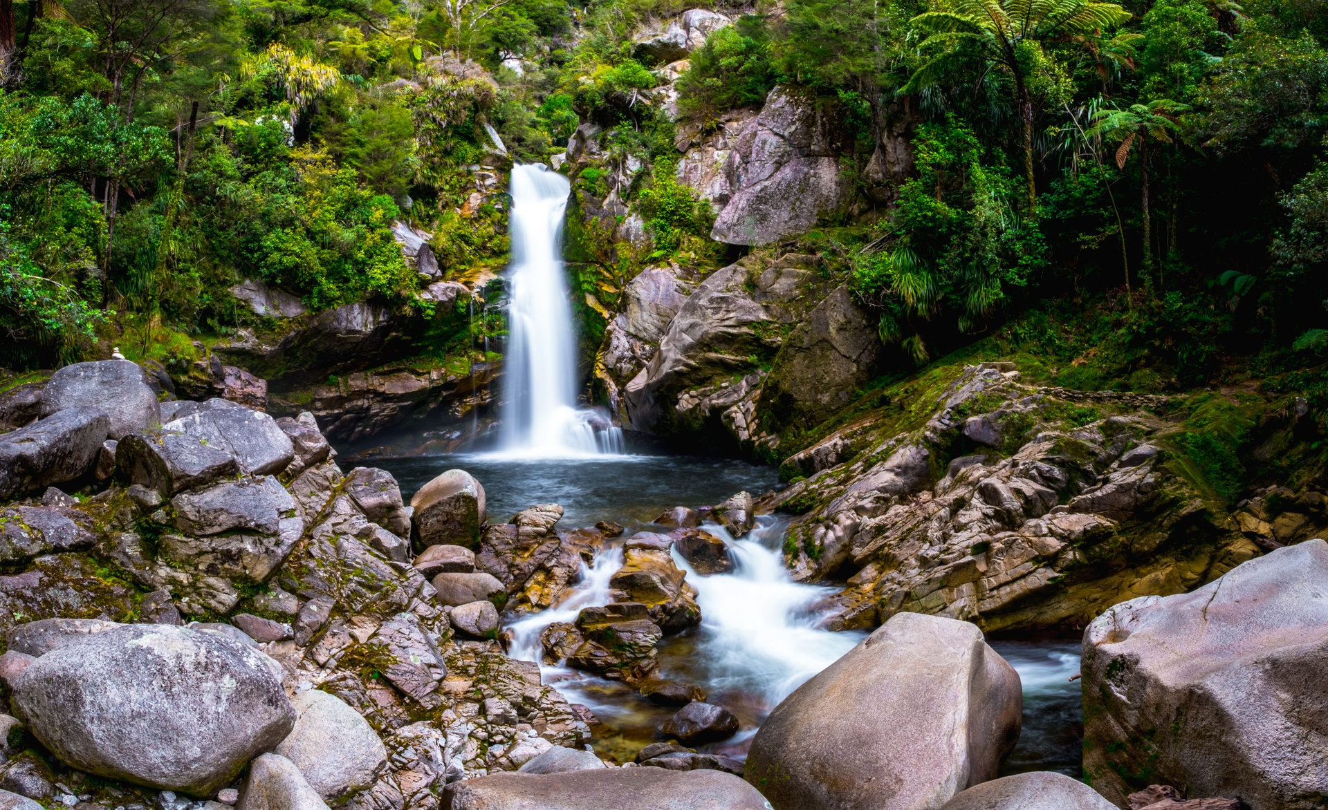 Beautiful waterfalls in the green nature, Wainui Falls, Abel Tasman, New Zealand.