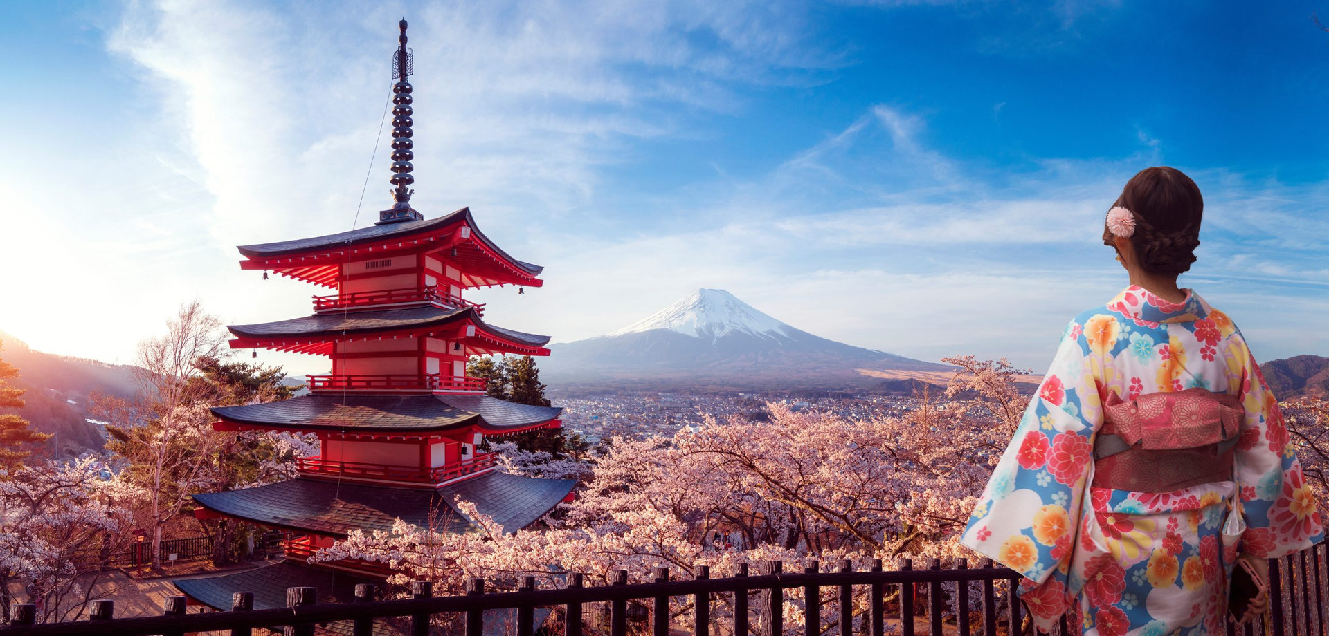 Japanese girl travel in kimono traditional dress at Landmark of japan Chureito red Pagoda and Mt. Fuji in Fujiyoshid