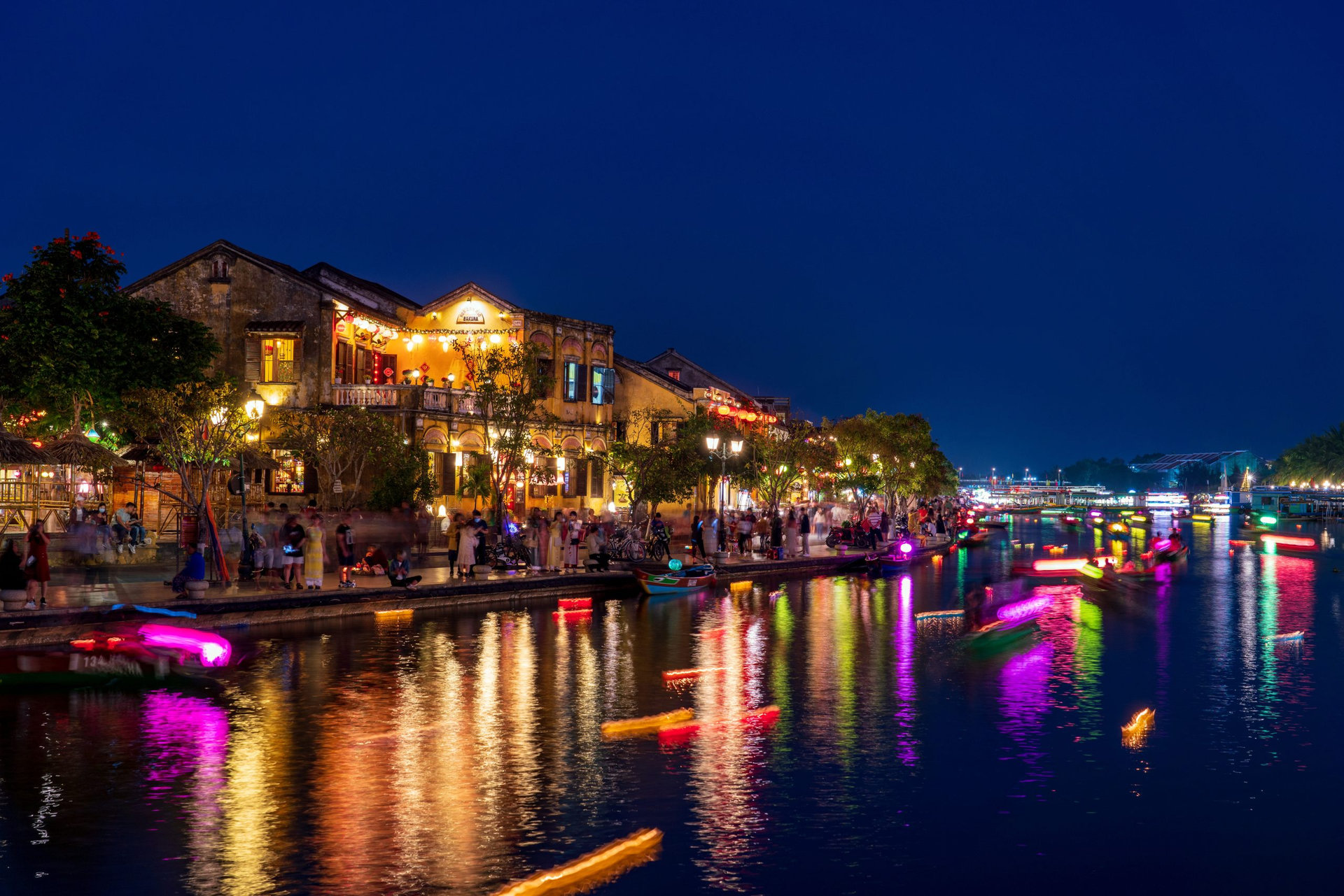 Light trails of passenger boats at Hoi An, Vietnam