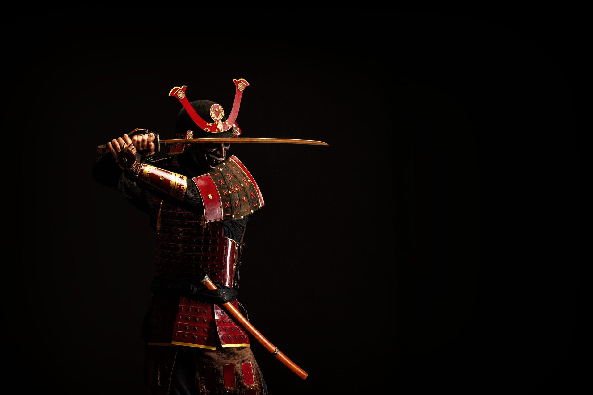Portrait of a samurai in armor in attack position