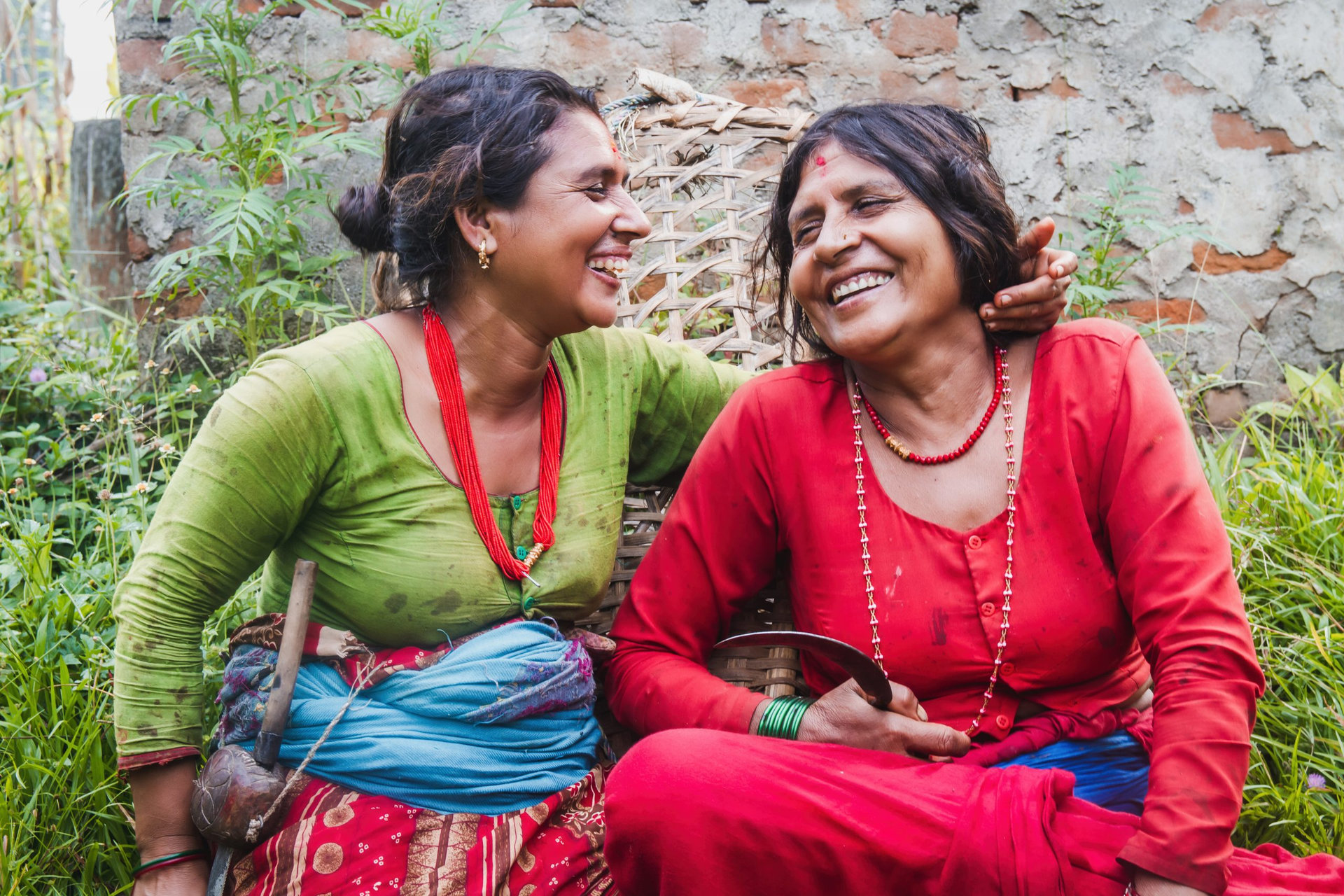 Happy Nepali women on traditional attire in the rural village of Nepal. Nepalese women