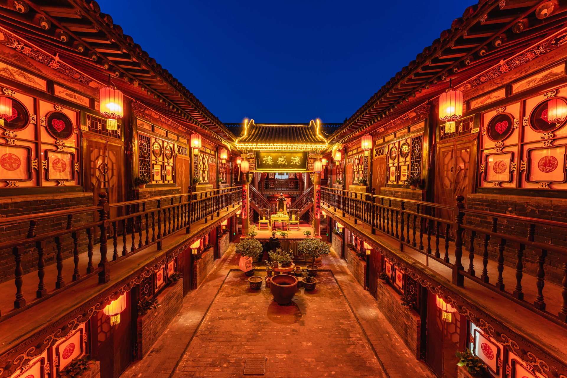 Night view of ancient Chinese traditional residential buildings in Pingyao old Town, Shanxi, China