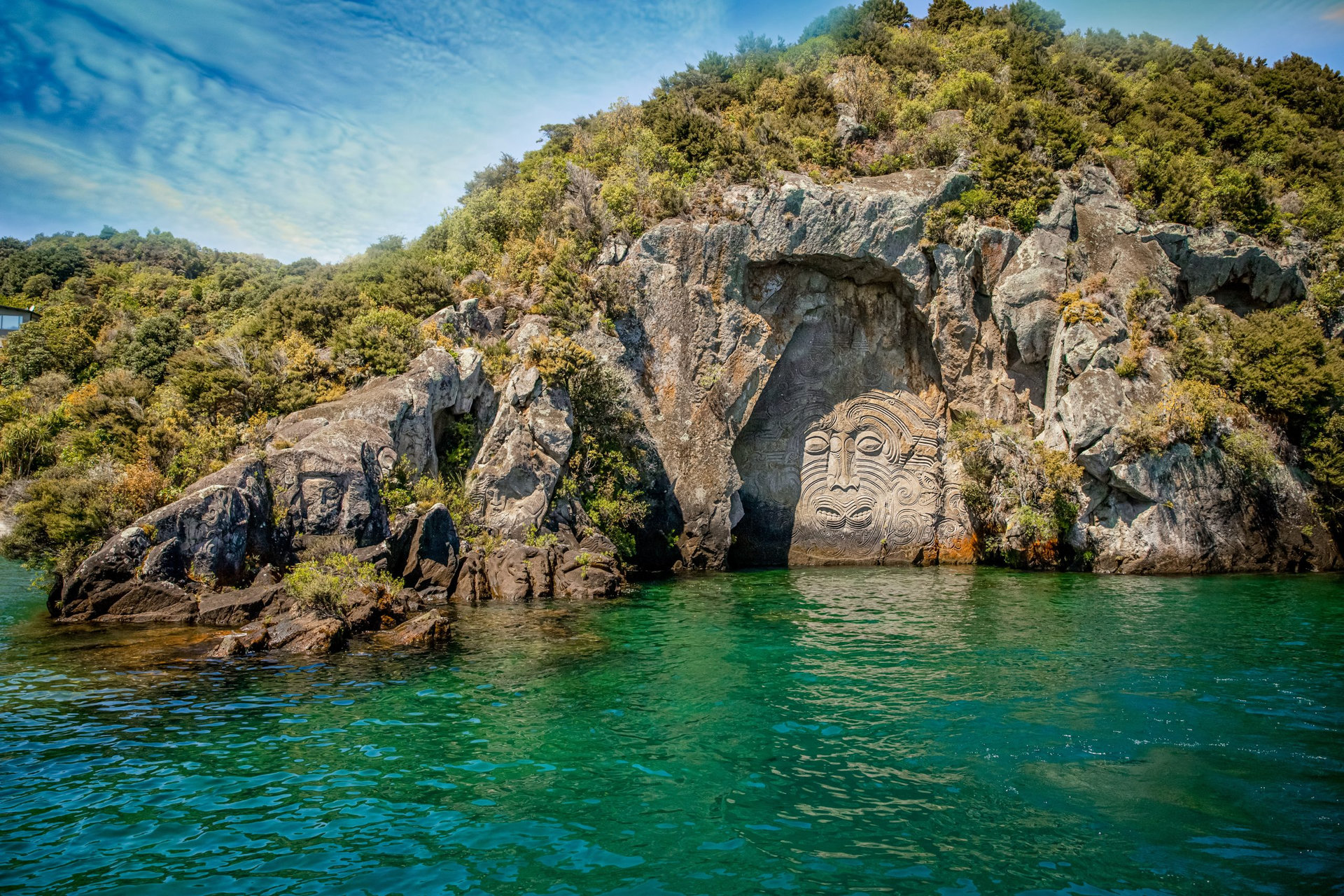 traditional rock carving lake taupo north island new zealand. High quality photo