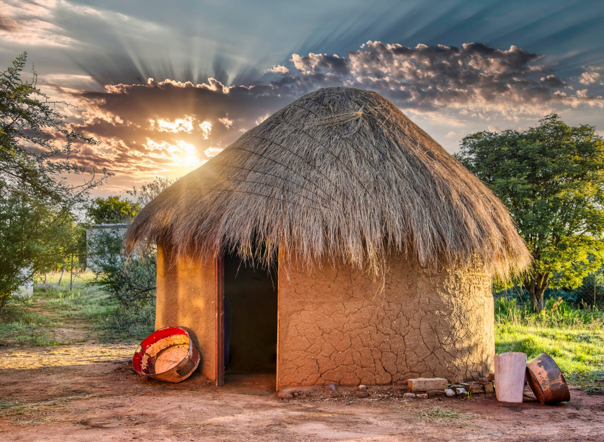 traditional thatched roof hut in a village in botswana