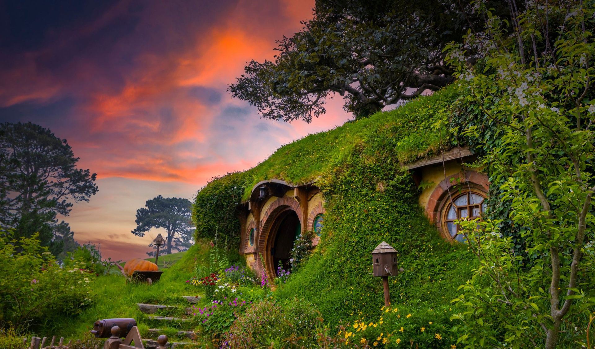 MATAMATA- NEW ZEALAND -NOVEMBER -2- 2022: Hobbiton - movie set created for filming the Lord of the Rings and "Hobbit" movies - Matamata, New Zealand,spring scene background