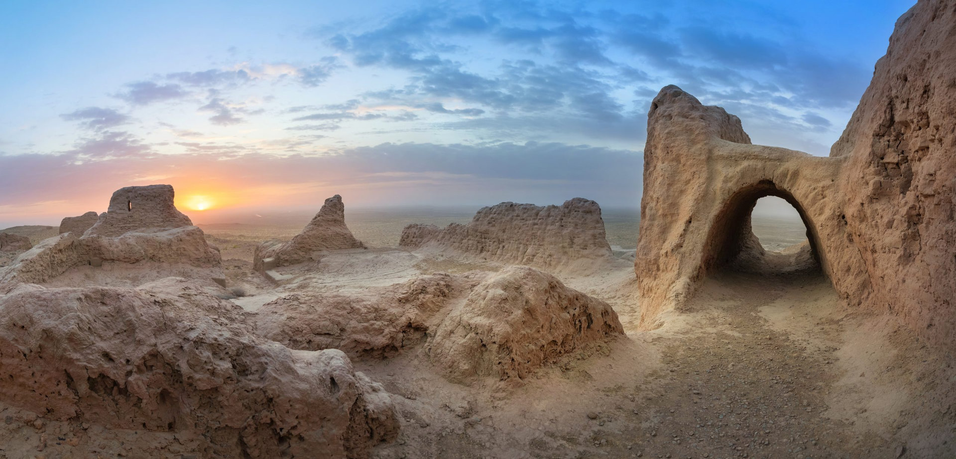 Panoramic view of abandoned ruins of ancient Khorezm fortress Ayaz Kala in Kyzylkum desert, Uzbekistan